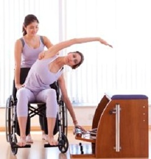Pilates sobre cadeira de rodas